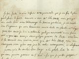 un gros plan d'un morceau de papier sur lequel on a écrit