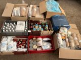 a lot of boxes of food and drinks on the ground