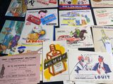 many different types of advertising posters on the table