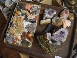 a tray with a variety of rocks on it on a table