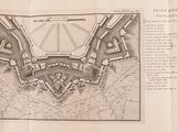 an old map of a city with a lot of buildings on it