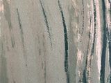 painting of a person riding a surfboard on a wave in the ocean