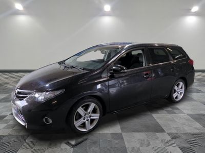 a picture of a black toyota sienna parked on a checkered floor