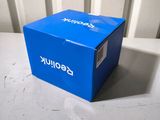 an image of a blue box sitting on top of a white table