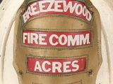 a close up of a fireman ' s helmet on display