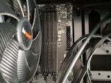 a fan that is attached to the side of a computer