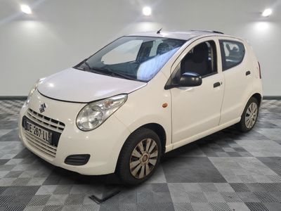 a picture of a small white car on a checkered floor
