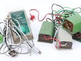many electronic devices that are sitting on a white surface