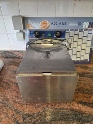 an image of a commercial fryer on a counter top
