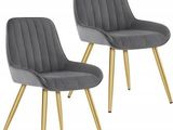 pair of grey velvet dining chairs with gold legs