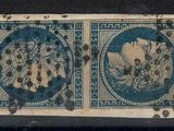 an old stamp with a picture of a woman on it