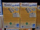several boxes of game cards are stacked on top of each other