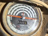 a close up of a speedometer on a motorcycle