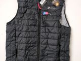 a close up of a black vest with a tag on it