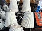 a lot of lamps that are sitting on a table
