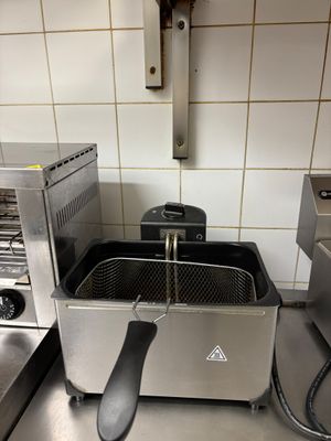 an image of a commercial fryer in a commercial kitchen