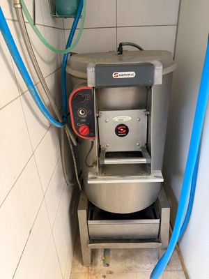 a machine that is sitting in the corner of a room