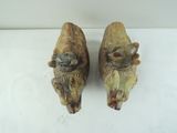two figurines of mice sitting on top of each other