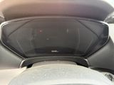a car dashboard with a digital display on it