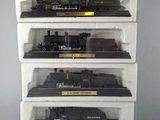 a stack of toy trains sitting on top of each other