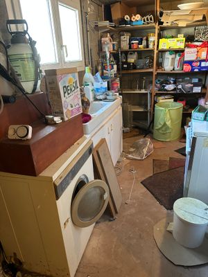 a washer and dryer in a room that is being remodeled