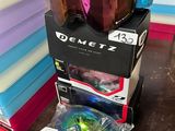 a box with a pair of goggles sitting on top of it