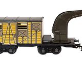 a toy train with a crane attached to it ' s side
