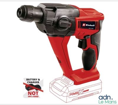 a corded drill with a battery attached to it