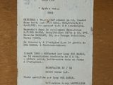 a piece of paper that has been written on a wooden table