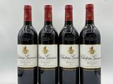trois bouteilles de vin rouge posées l'une à côté de l'autre sur une surface blanche