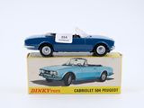 a blue toy car sitting on top of a box