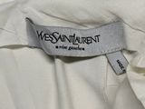 a label on a white shirt that says yves saint laurent