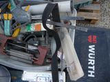 a pile of tools that are sitting on top of a table