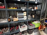 a room with a lot of tools on the shelves