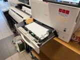 a printer that is sitting on top of a desk