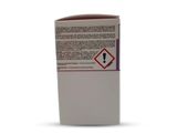 une image représentant une bouteille d'alcool avec une étiquette dessus