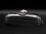 a black bag that is sitting on a black surface