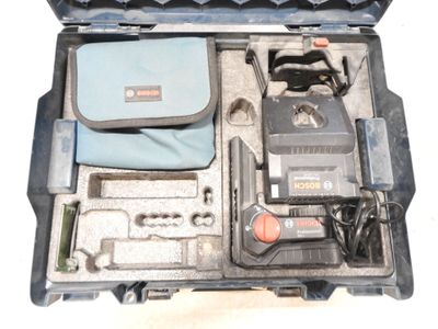 a tool case with tools in it on a white surface