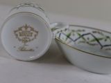 a small bowl and a small bowl sitting on a table