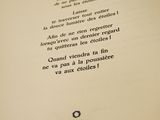 an open book with a picture of a man on it