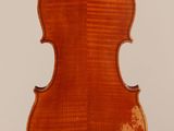 an old violin with a very long neck and a very long back