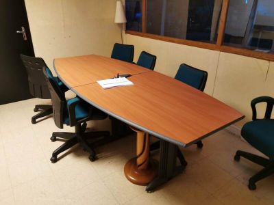 an image of a conference room with chairs and a table