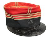 a red and black hat with the number 63 on it