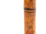 an image of a wooden tube with a picture of a woman on it