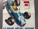 french poster of a blue race car with a man in the driver ' s seat