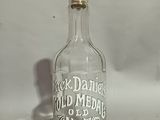 a glass bottle with a message on it that says jack daniels old medical no 7