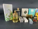 many different types of perfumes on the table