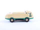 a toy truck that is sitting on a white surface
