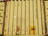 a yellow container sitting on top of a blue container