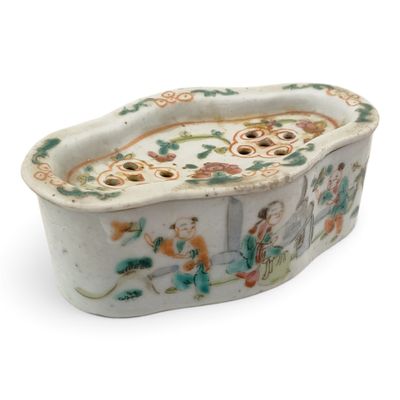 an image of a porcelain bowl with flowers and birds on it